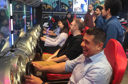 Information Security team socializing with a round of arcade games.