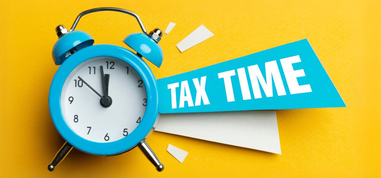 A clock beside the text, "Tax time"