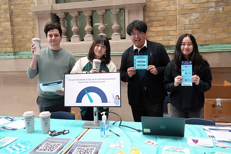 A group of students at the information security booth.